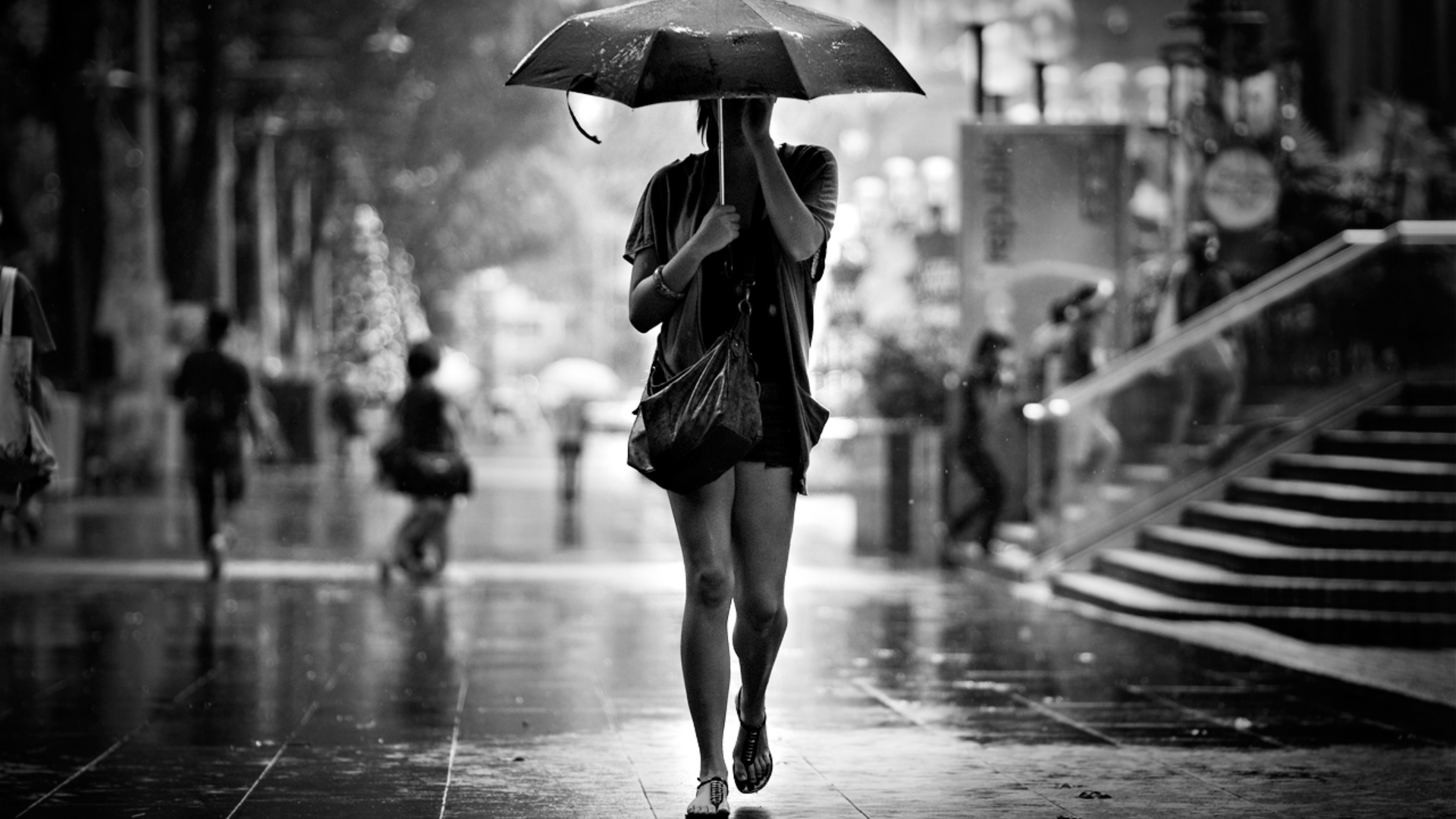 woman-umbrella-rain-street